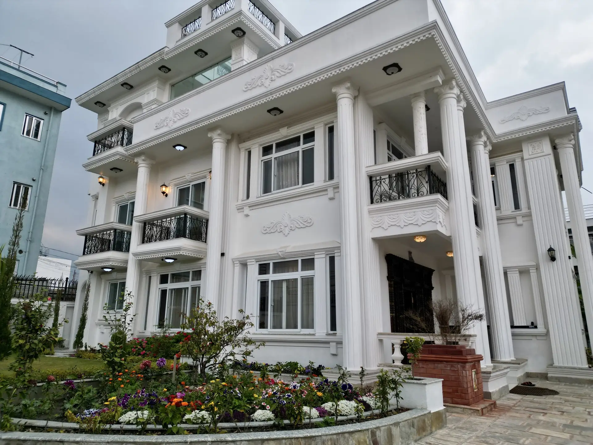 Neoclassical Family Home: Completed neoclassical family home in Nepal
