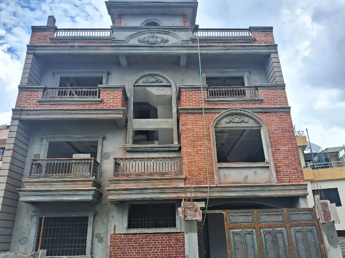 Arched Brick Residence: Brick residence with arched openings, built by HNG in Nepal, image 2 of 2