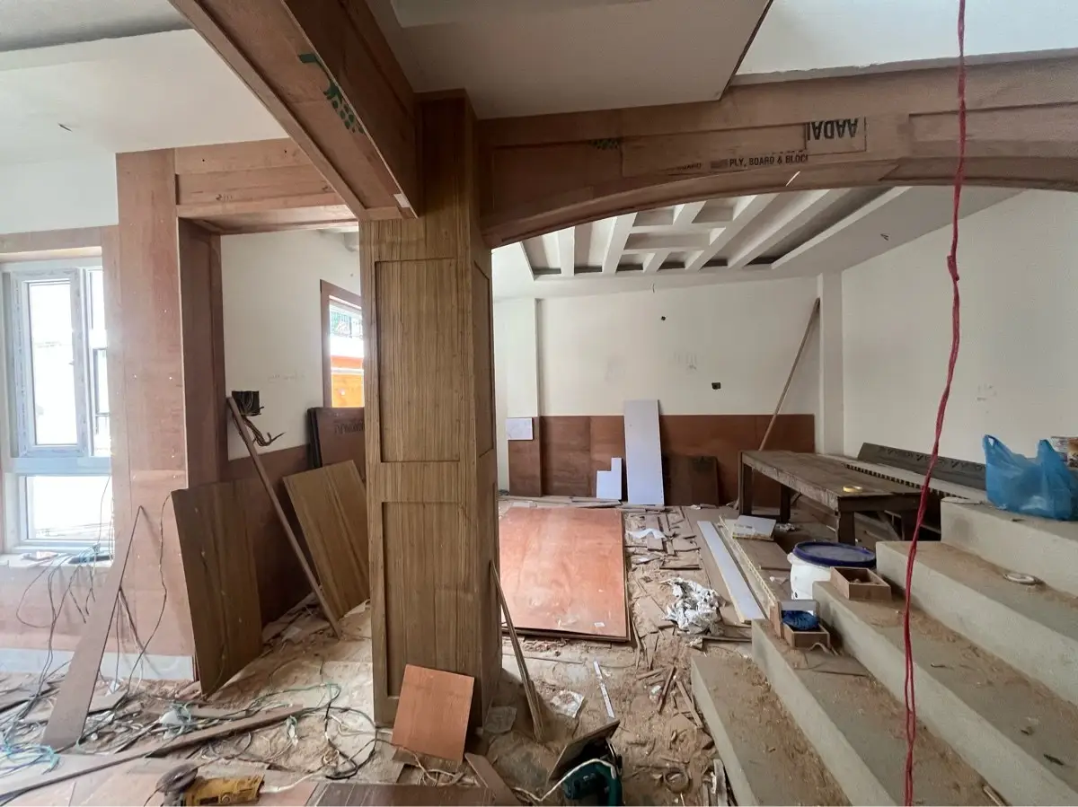 Timber-Frame Residence: Residence with timber interior framing during construction, by HNG, image 2 of 4